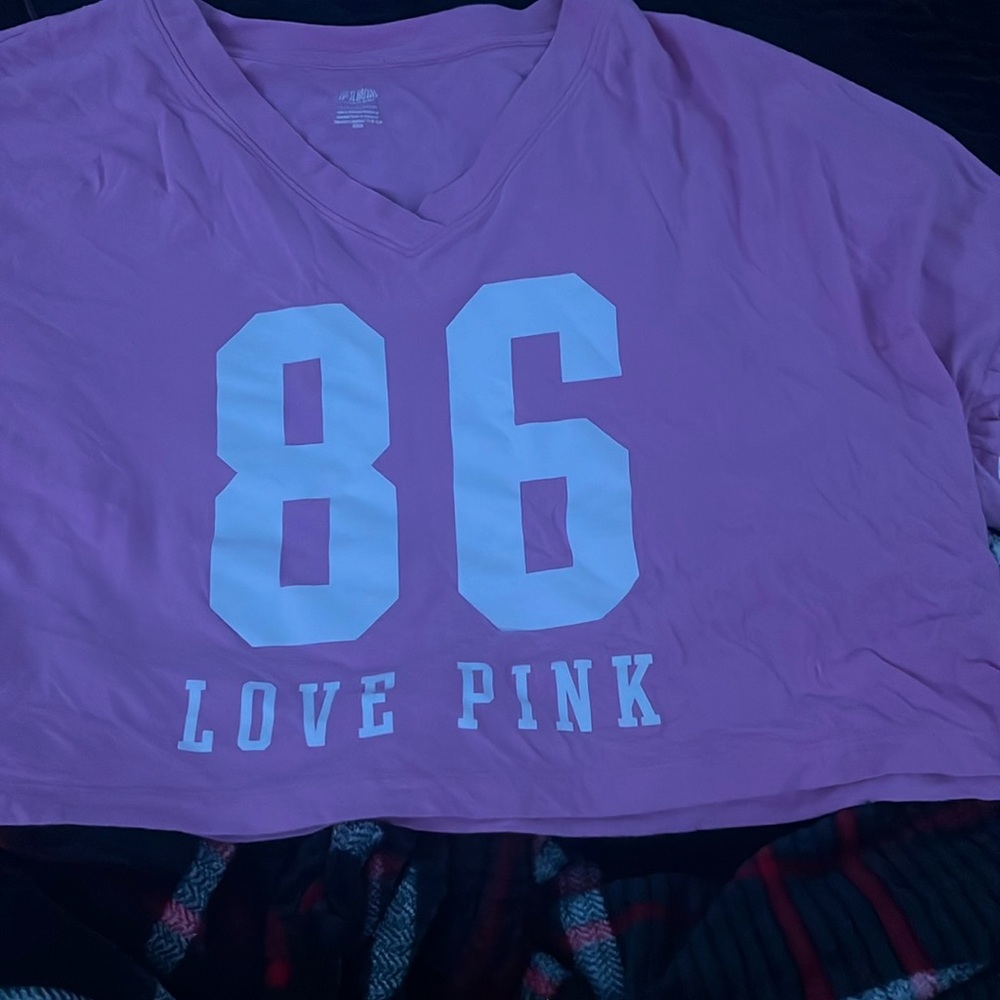 A xl pink oversized cropped top it has a small stain on the back